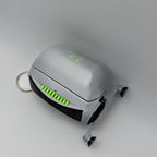 Small electronic device with green lights on a gray background